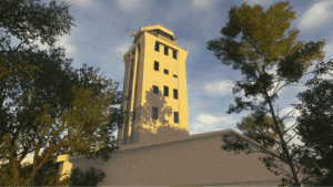 Airport control tower surrounded by trees in warm evening light, recreated in Microsoft Flight Simulator 2024